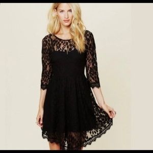 Free People black long sleeve lace dress. Very flattering!!